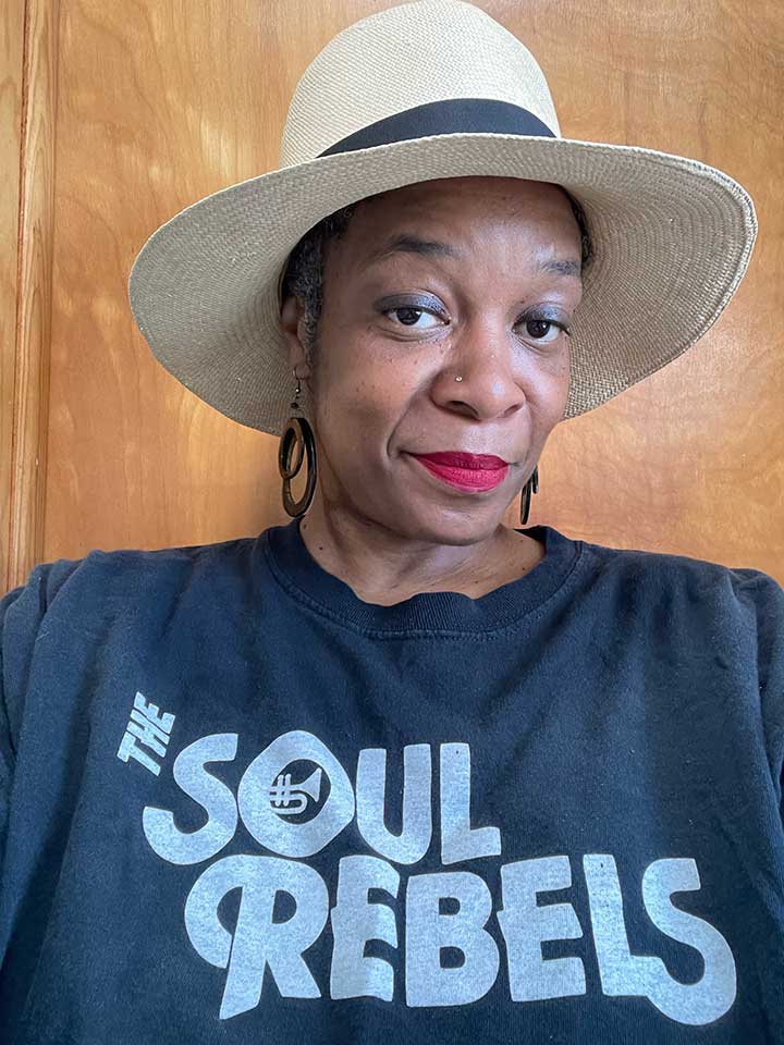 Kishi Ducre with hat